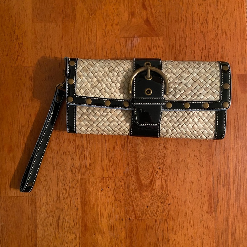 Coach wristlet. Perfect for the summer. Straw and black,patent leather.
